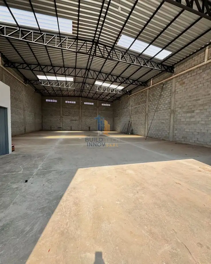 Storage warehouse with a metal frame and skylights, built by Build Tech Innov